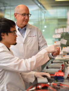 Penn Medicine physician-scientist Daniel Kelly (right) with postdoctoral researcher Tomoya Sakamoto in lab several years ago. During the past month, the Kelly Lab has had regular video lab meetings and virtual journal clubs and coffee breaks, to keep work moving and give lab members face time.